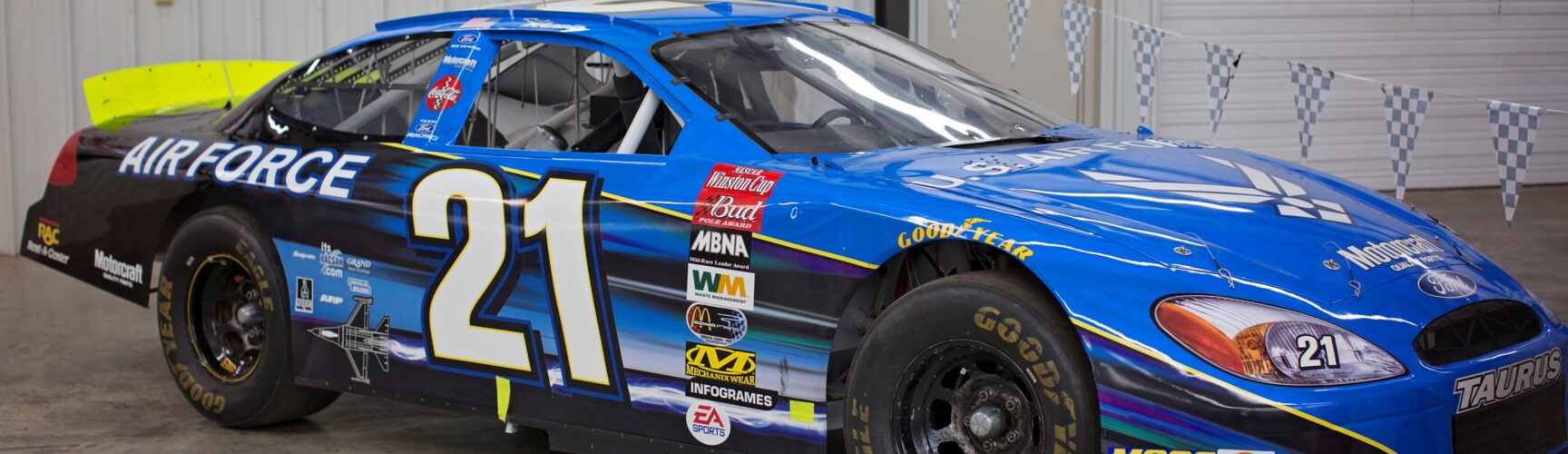 Blue race car with number 21